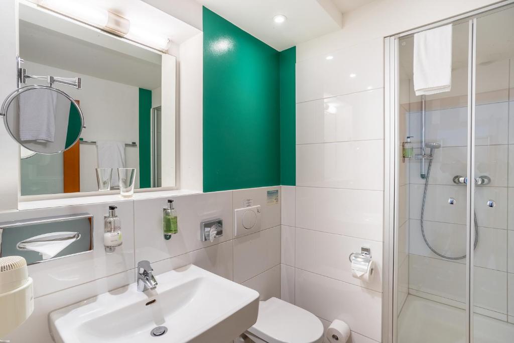 Koupelna v ubytování Hotel Bayrischer Hof