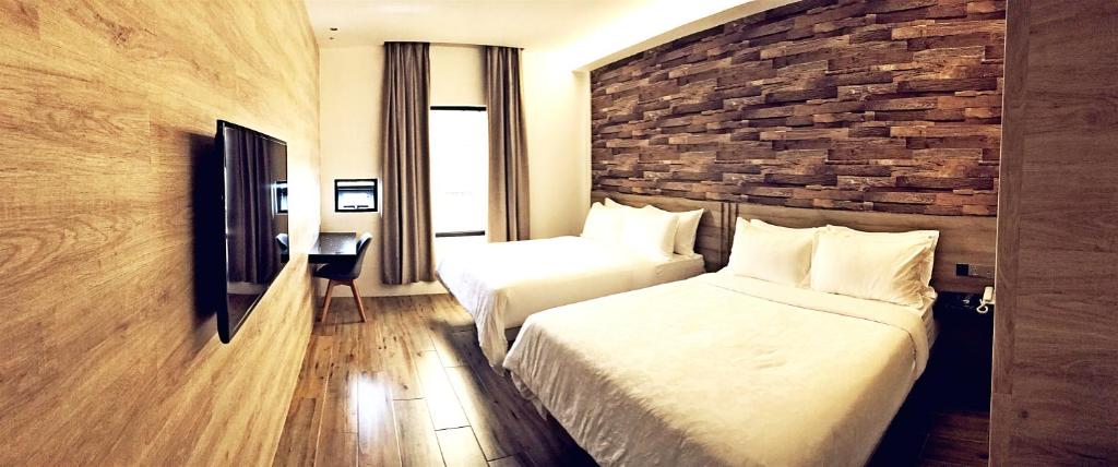 TV a/nebo společenská místnost v ubytování Hotel Legend Boutique