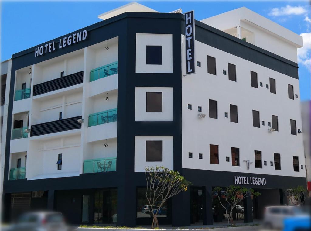 a building with a black and white at Hotel Legend Boutique in Johor Bahru