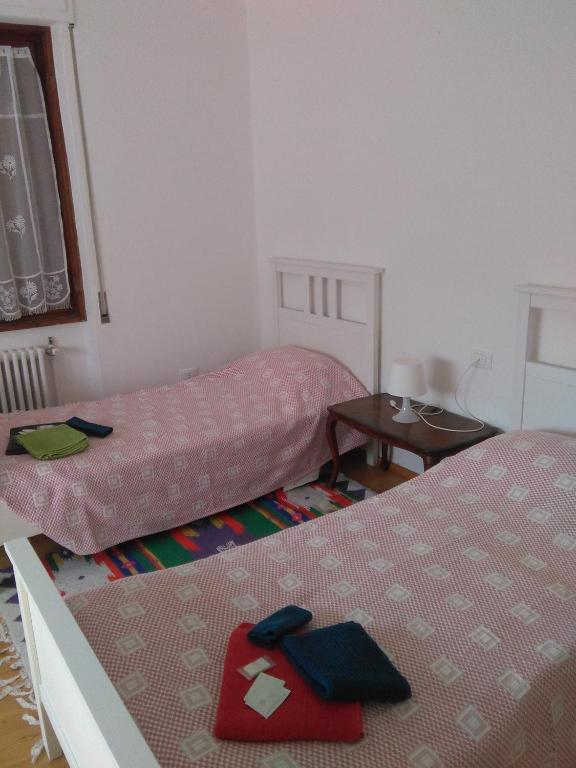 Postel nebo postele na pokoji v ubytování Ristoro 25 Aprile