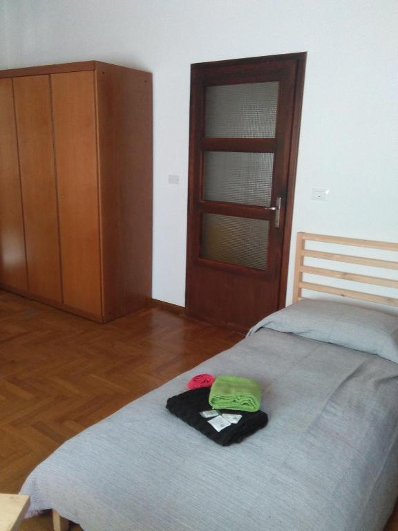 Postel nebo postele na pokoji v ubytování Ristoro 25 Aprile
