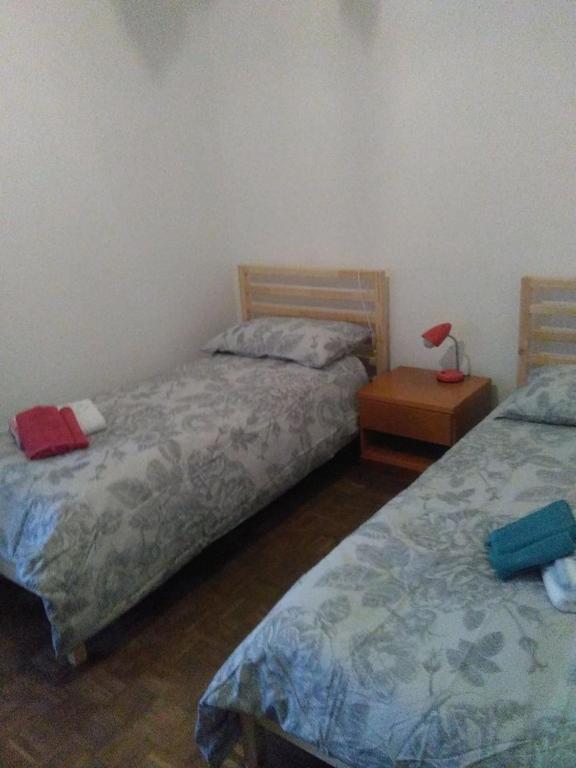 Postel nebo postele na pokoji v ubytování Ristoro 25 Aprile