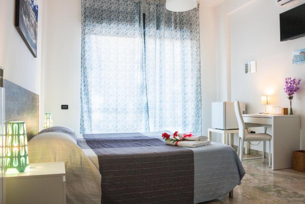 Postel nebo postele na pokoji v ubytování Darrè