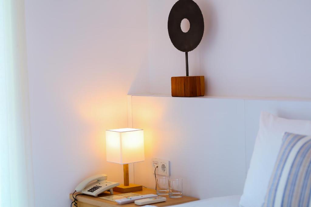 Postel nebo postele na pokoji v ubytování Dias Hotel