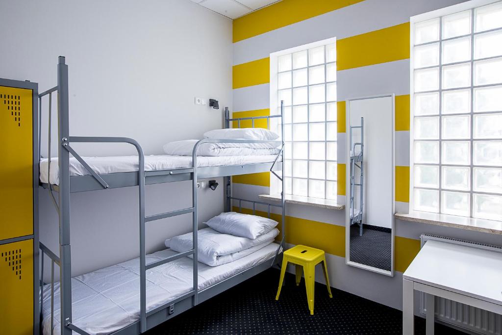 Posteľ alebo postele v izbe v ubytovaní Inbed Hostel