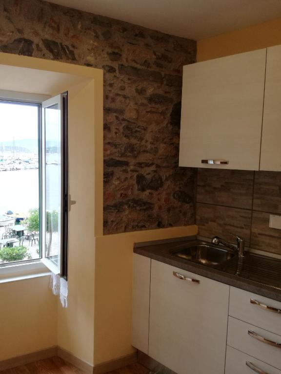 Kuchyň nebo kuchyňský kout v ubytování Casa di Stella