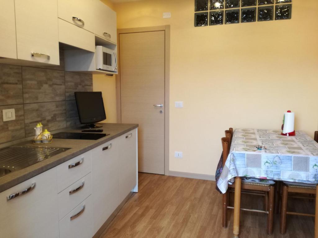 Kuchyň nebo kuchyňský kout v ubytování Casa di Stella