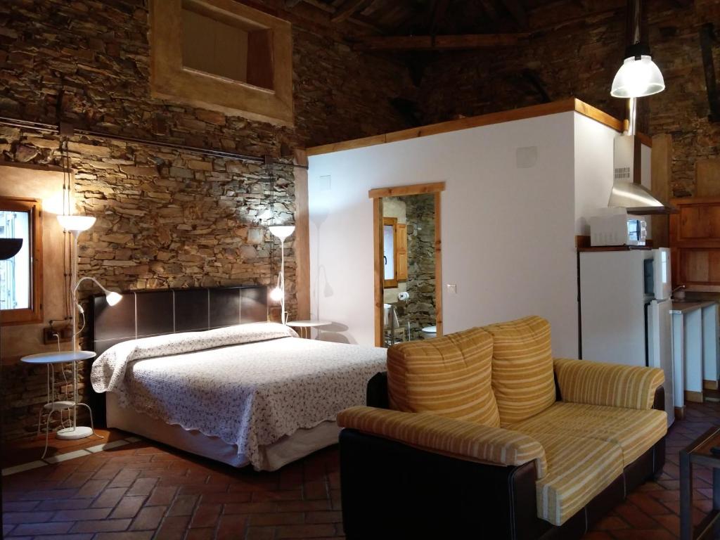 Ένα ή περισσότερα κρεβάτια σε δωμάτιο στο La Posada Del Corralón