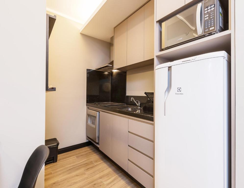 Kuchyň nebo kuchyňský kout v ubytování I am Design Hotel Campinas by Hotelaria Brasil