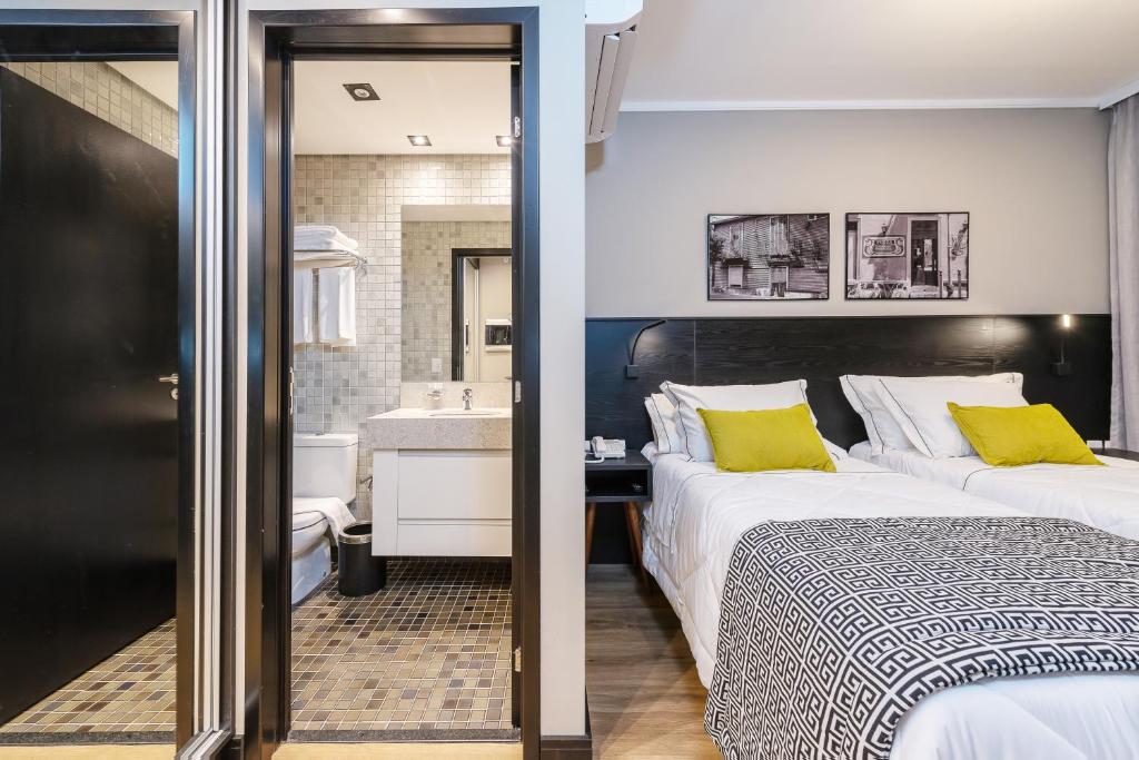 Postel nebo postele na pokoji v ubytování I am Design Hotel Campinas by Hotelaria Brasil