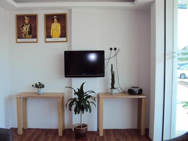 TV a/nebo společenská místnost v ubytování GM City Hotel