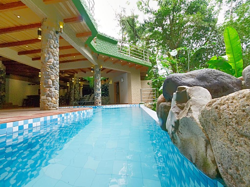 Bazén v ubytování Arahuana Jungle Resort & Spa nebo v jeho okolí