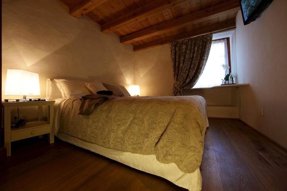 Łóżko lub łóżka w pokoju w obiekcie Maison Bondaz & SPA privé