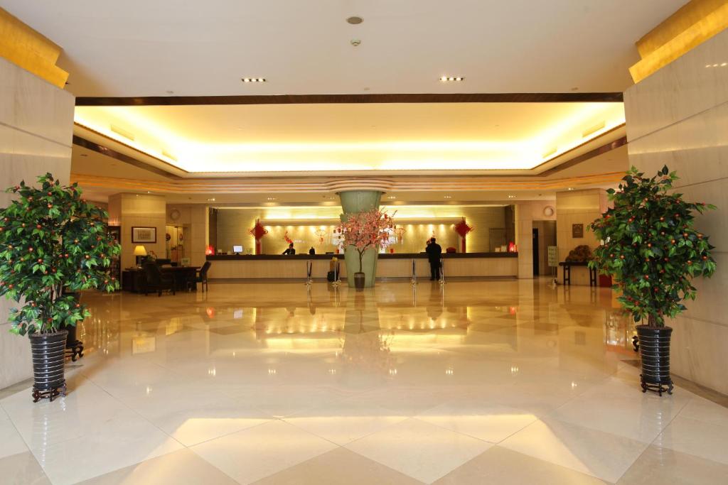 Vstupní hala nebo recepce v ubytování Merry Hotel Shanghai (Former Rendezvous Merry Hotel Shanghai)