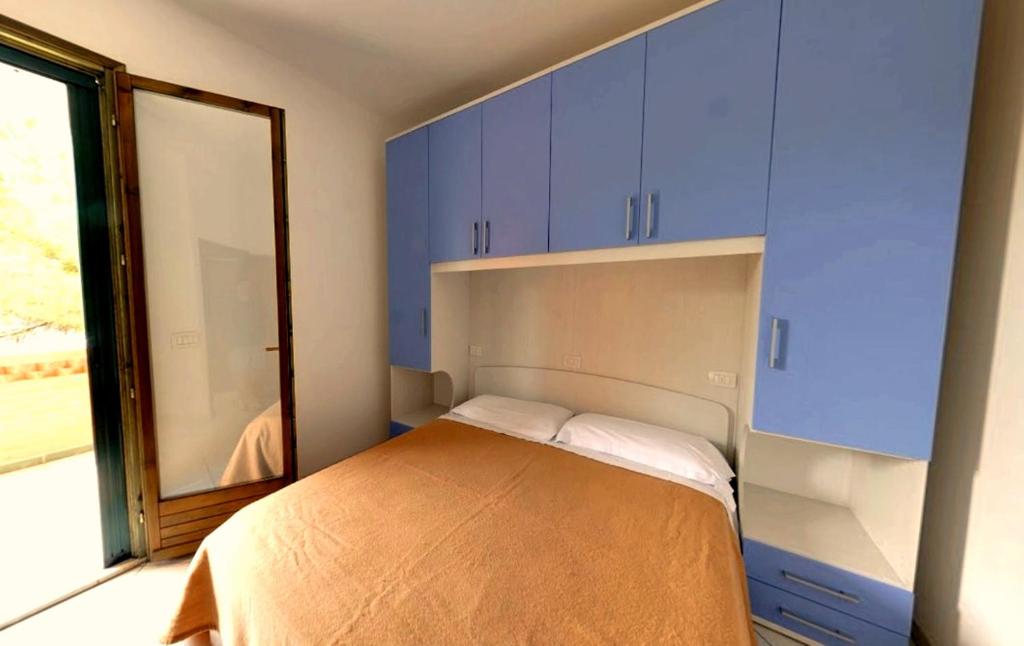 A bed or beds in a room at Pomposa Residence