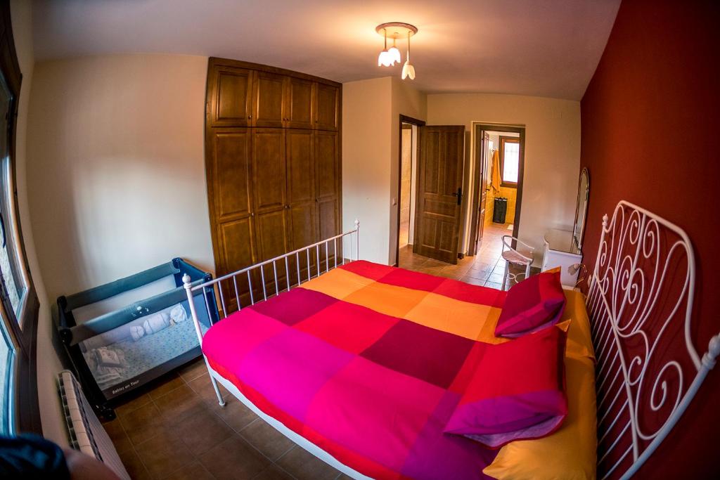 Postel nebo postele na pokoji v ubytování El Encinar