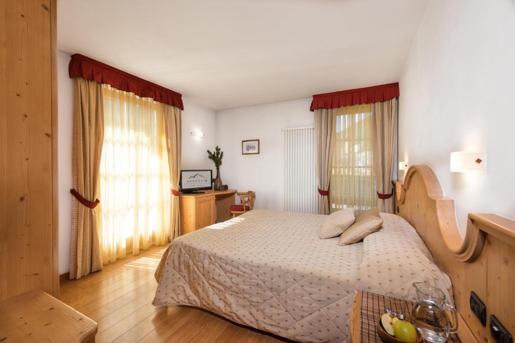 Postel nebo postele na pokoji v ubytování Romantic Charming Hotel Rancolin