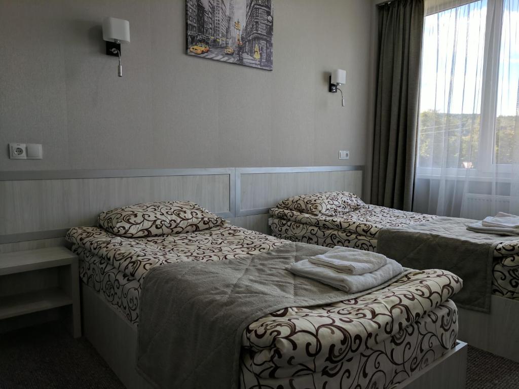 Postel nebo postele na pokoji v ubytování Art Hotel Palma