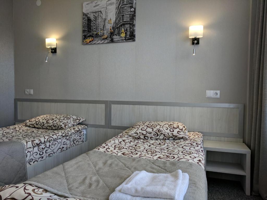 Postel nebo postele na pokoji v ubytování Art Hotel Palma