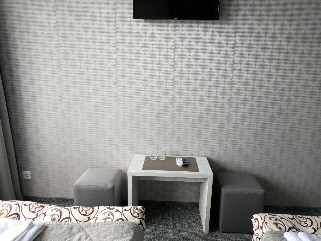 TV a/nebo společenská místnost v ubytování Art Hotel Palma