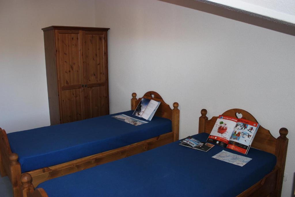 Postel nebo postele na pokoji v ubytování Peclet Appartements VTI