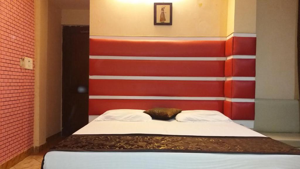 Postel nebo postele na pokoji v ubytování Hotel Kwality
