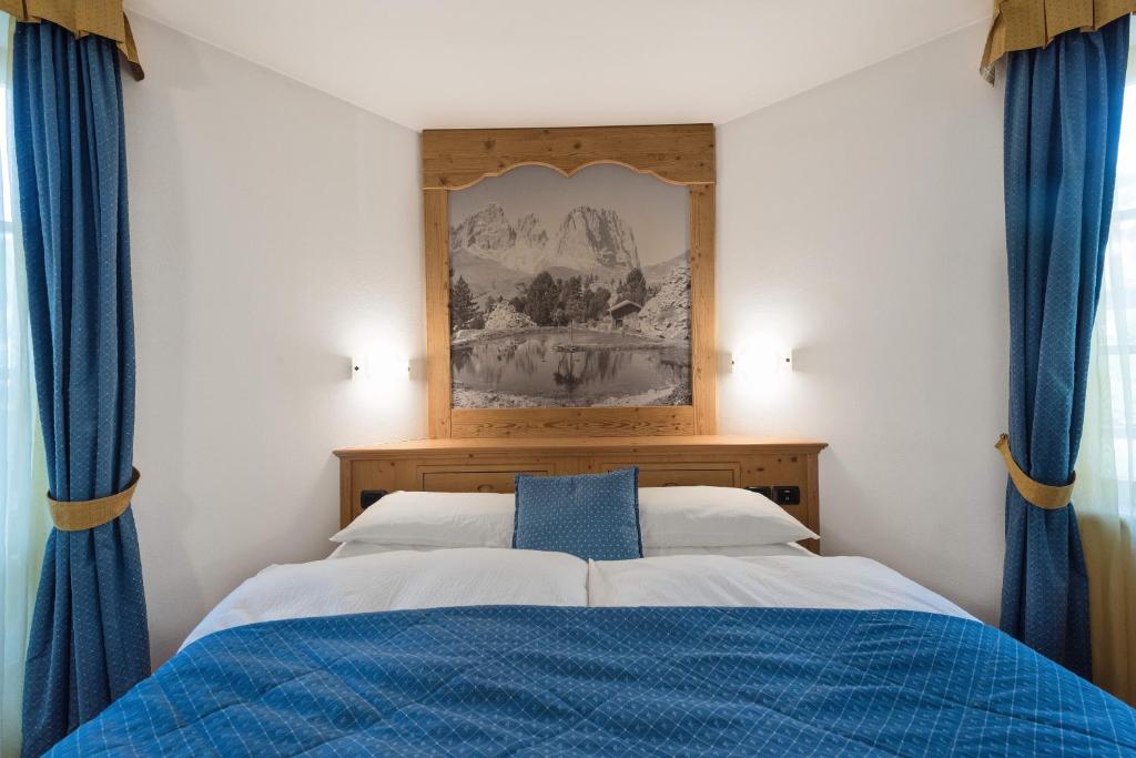 Postel nebo postele na pokoji v ubytování Romantic Charming Hotel Rancolin