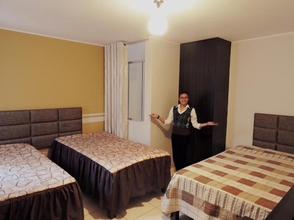 Postel nebo postele na pokoji v ubytování Majestuoso Hospedaje