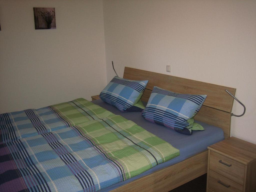 Postel nebo postele na pokoji v ubytování Ferienhaus Tamm-Voß