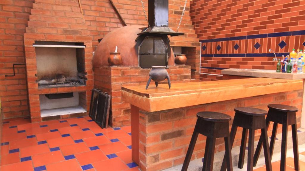 Kuchyň nebo kuchyňský kout v ubytování Kucha Wasi Hosteria