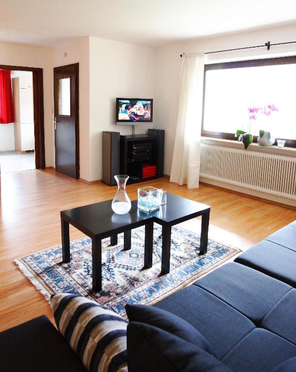 TV a/nebo společenská místnost v ubytování Rodlers Chalet