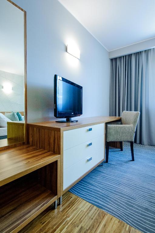 TV a/nebo společenská místnost v ubytování Hotel Active
