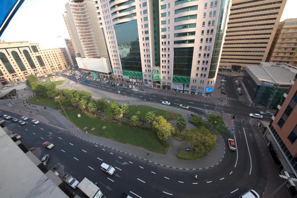 an aerial view of a street in a city at White Fort Hotel in Dubai