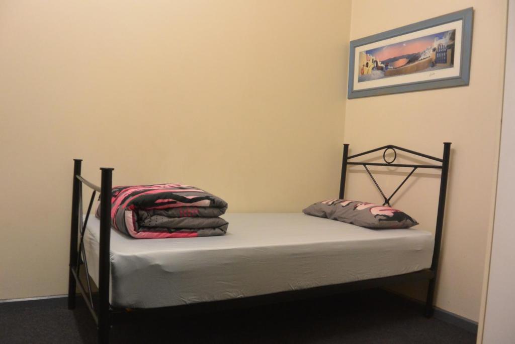 Postel nebo postele na pokoji v ubytování Elizabeth Hostel