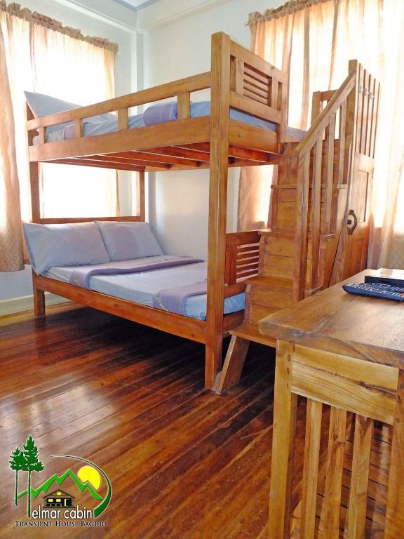 Postel nebo postele na pokoji v ubytování Elmar Cabin