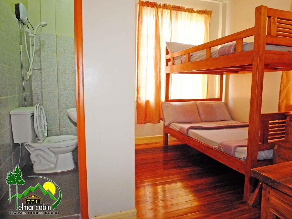 Postel nebo postele na pokoji v ubytování Elmar Cabin