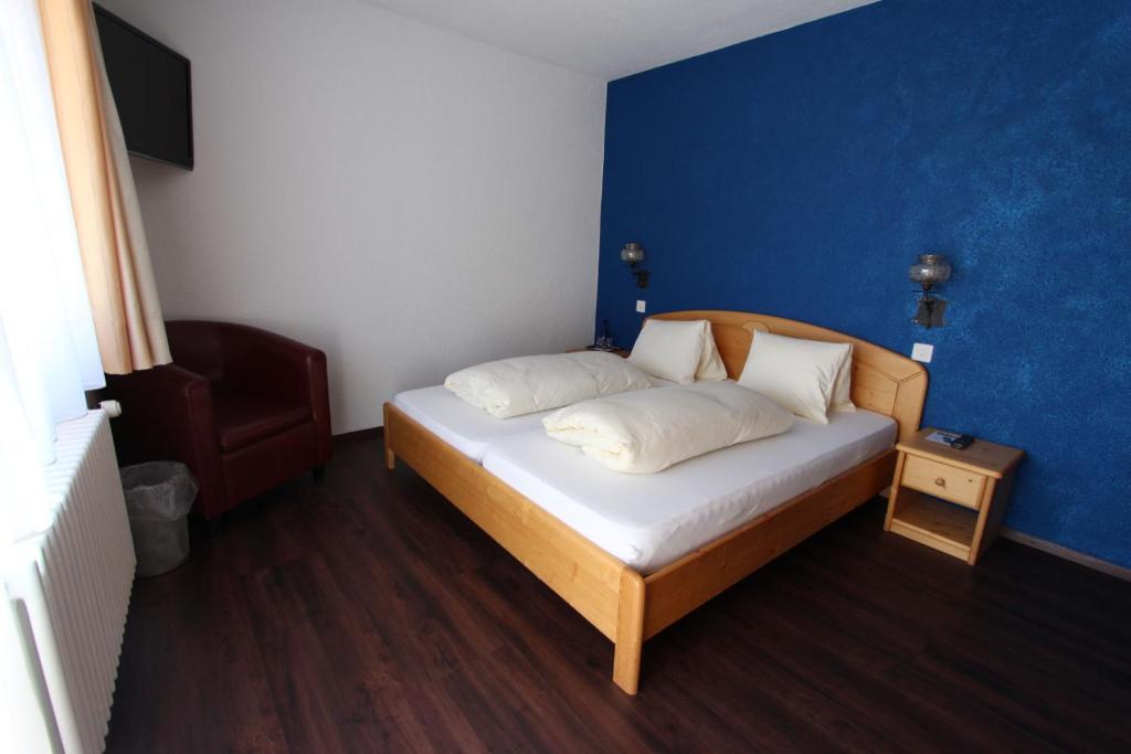 Postel nebo postele na pokoji v ubytování Hotel Al Rom
