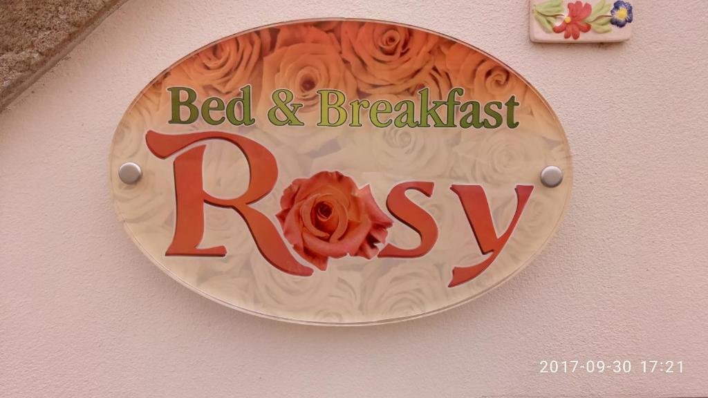 Certifikát, hodnocení, plakát nebo jiný dokument vystavený v ubytování Rosy B&B