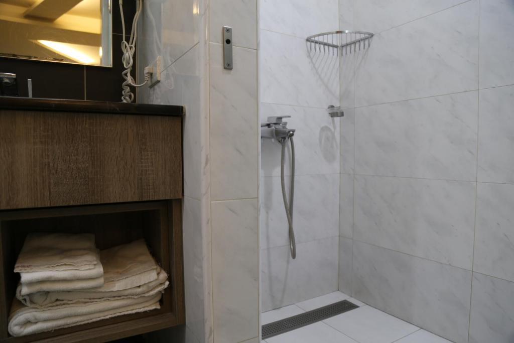 Koupelna v ubytování 德瑞旅店Direct Hotel
