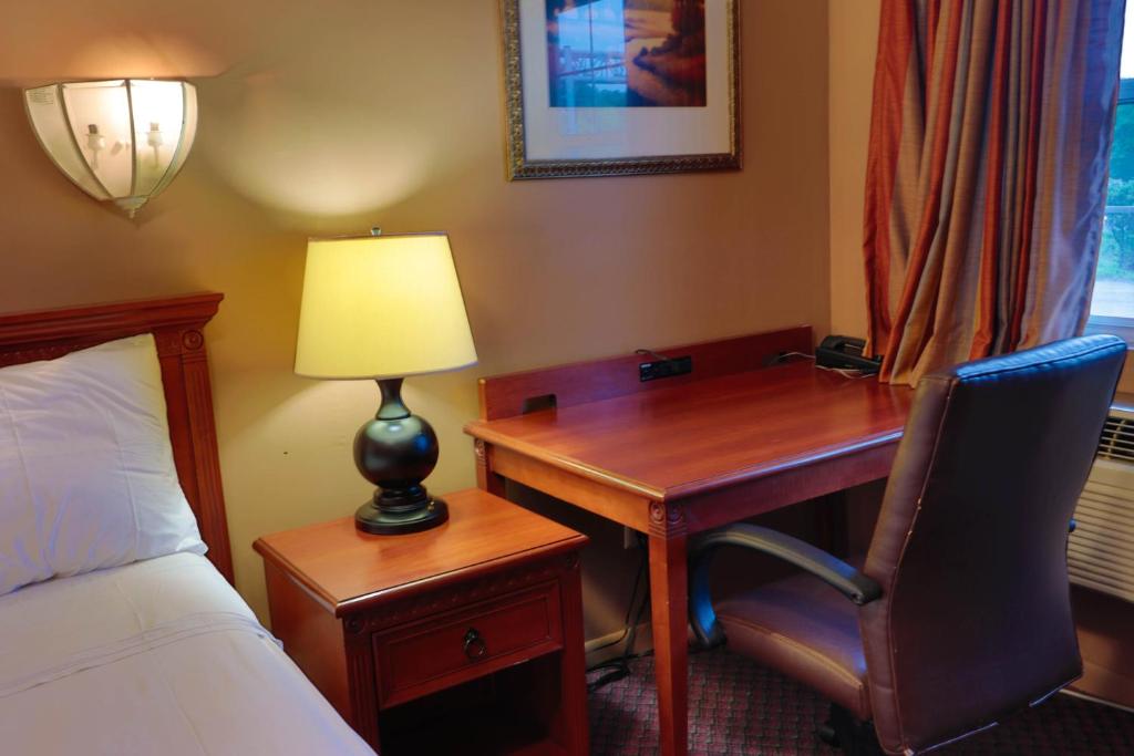 Postel nebo postele na pokoji v ubytování Red Carpet Inn Berlin