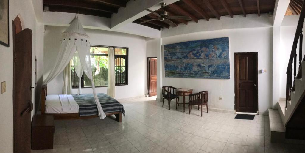 Postel nebo postele na pokoji v ubytování Baligen Bungalow