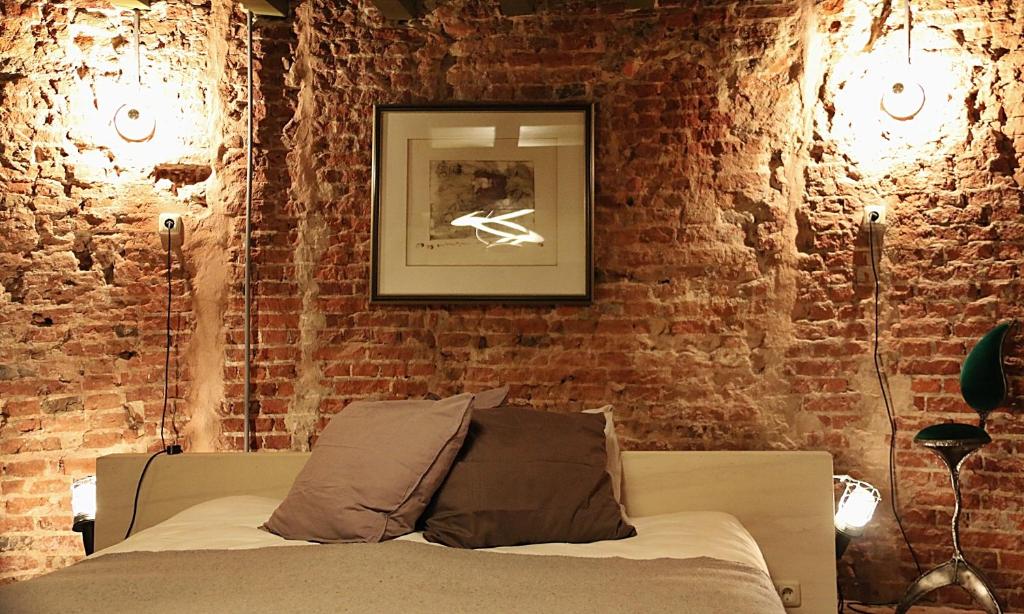 Een bed of bedden in een kamer bij De Pelsertoren
