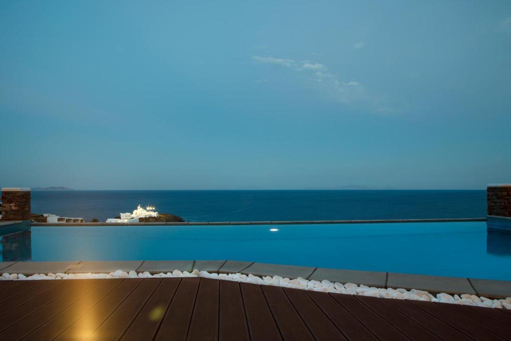 a view of the ocean from the roof of a building at Selana Suites in Chrisopigi