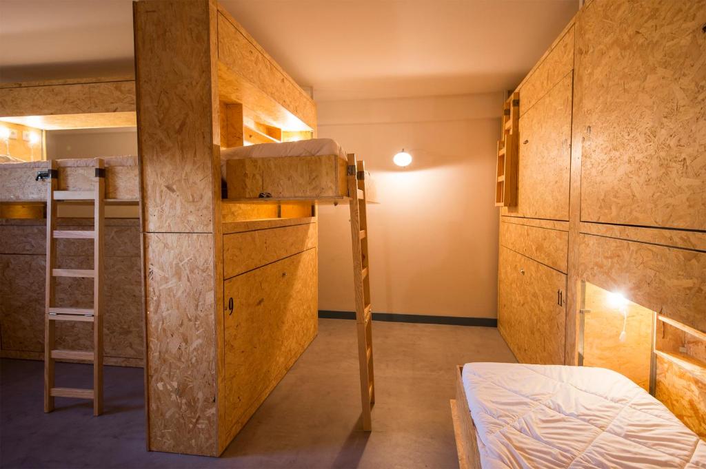Postel nebo postele na pokoji v ubytování Des Arts