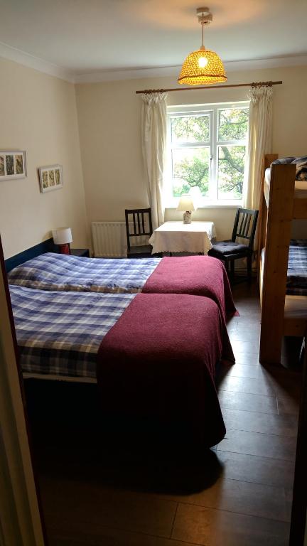 Postel nebo postele na pokoji v ubytování Kilcommon Lodge Holiday Hostel