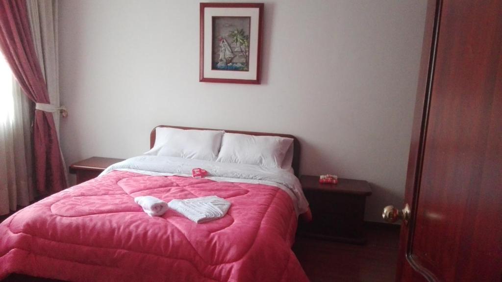Postel nebo postele na pokoji v ubytování D'lujo