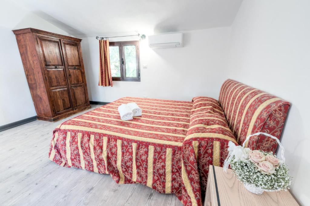 Postel nebo postele na pokoji v ubytování Ippotur Medieval Resort