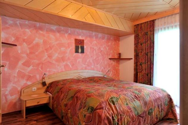 Postel nebo postele na pokoji v ubytování Bio-Bauernhof Reitmayrgut
