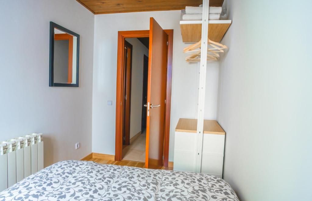 Postel nebo postele na pokoji v ubytování Ca' la Júlia