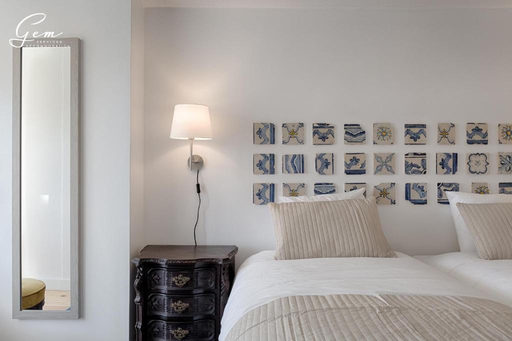 Postel nebo postele na pokoji v ubytování Seven Rivers Luxury Apartment